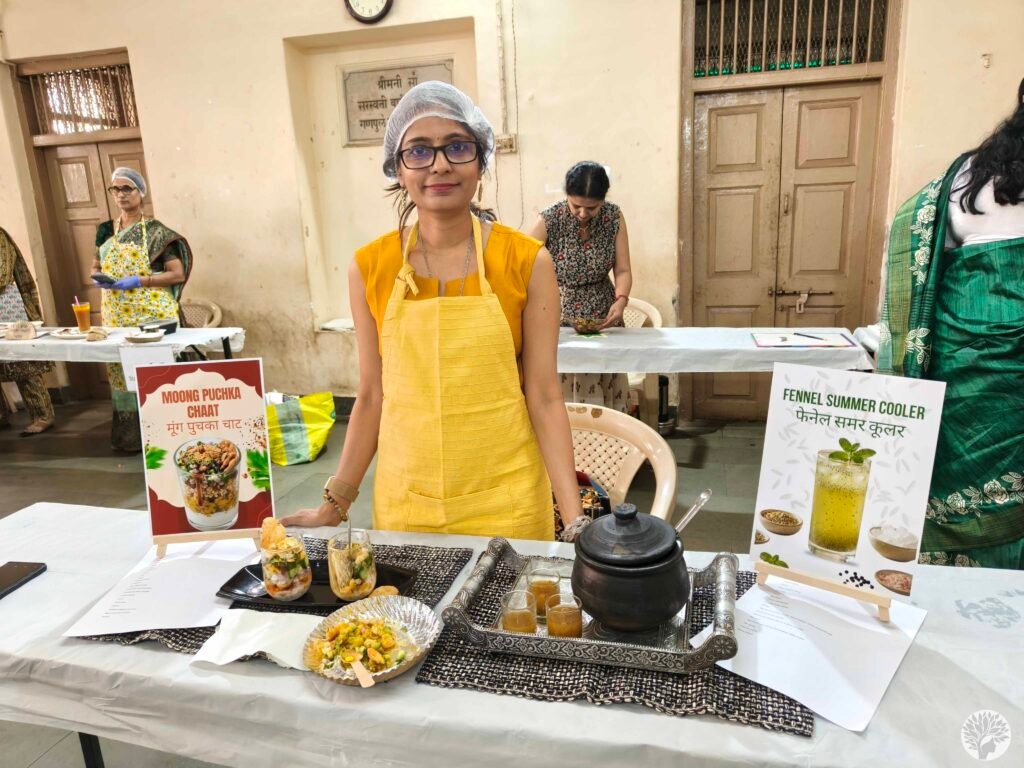 Hetal Patil at stall number five presenting her Moong Puchka Chaat and Fennel Summer Cooler after the mindful cooking contest in Baroda.